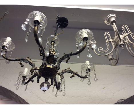 A six branch light fitting with glass droppers together with a white five branch light fitting, matching wall lights and a wh