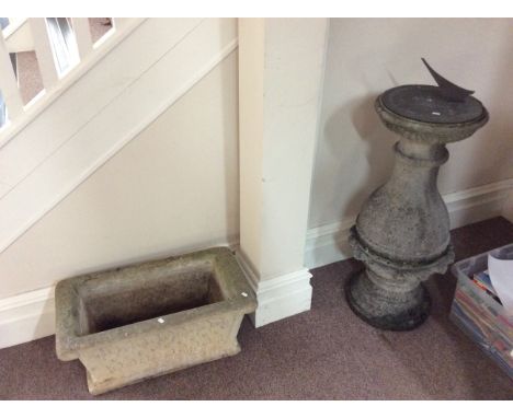 A concrete flower tray and sundial