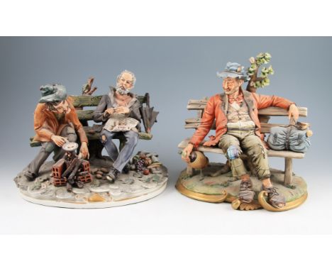 Two Capo di Monte ceramic figures of tramps on benches.