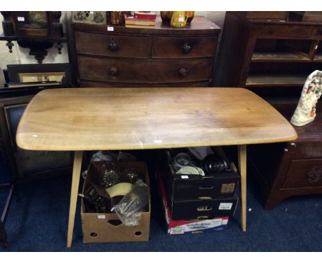 An Elm Ercol dining table.