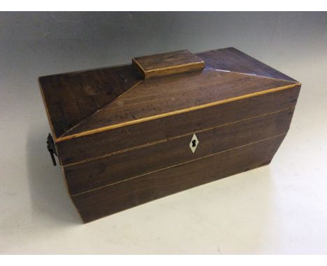 A Victorian mahogany tea caddy.