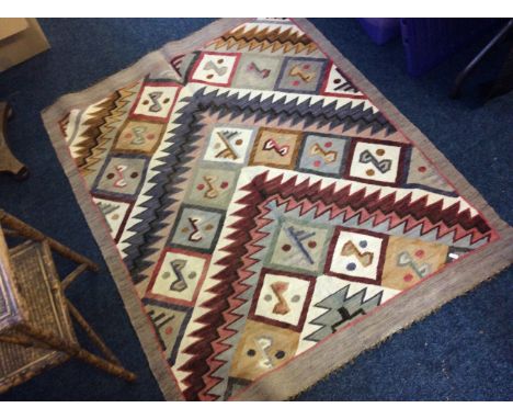 A blue, red and cream 'Inca' Aztec style rug.
