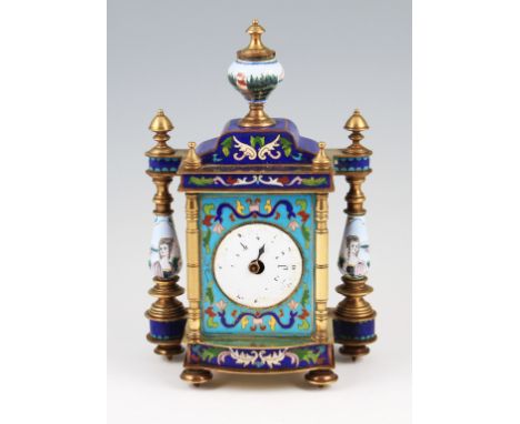An early 20th Century brass and enamel clock, possibly French, with enamelled floral design on light blue ground front with s