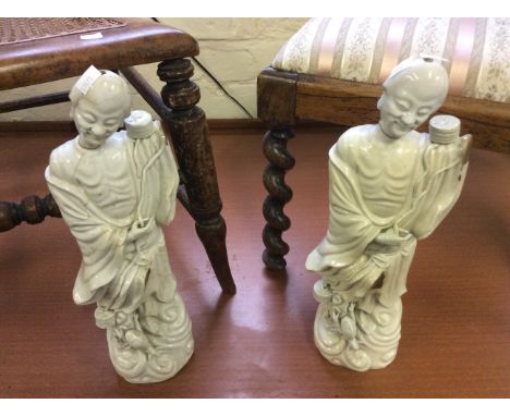Two ceramic blanc de chine oriental figures.