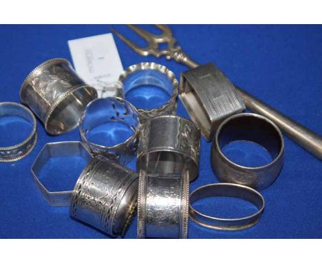 COLLECTION OF SILVER NAPKIN RINGS
thirteen in total, together with a silver fork (14)