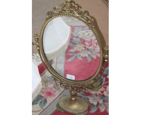 PAIR OF DECORATIVE BRASS DRESSING TABLE MIRRORS ( one lacking mirror )
together with a ceramic table lamp