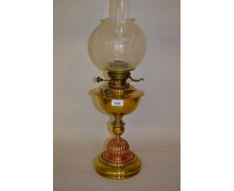 Arts and Crafts brass and copper baluster form oil lamp with etched glass shade and chimney 