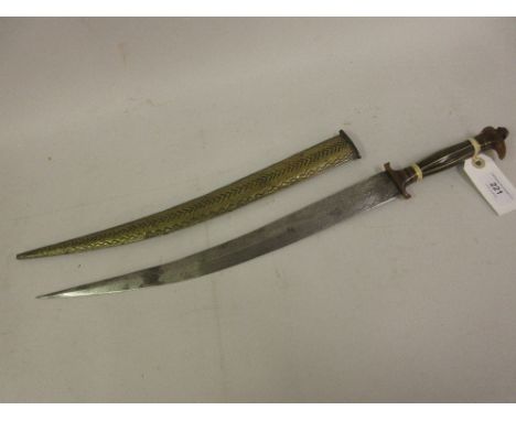 Middle Eastern dagger with embossed brass scabbard and wire inlaid horn grip 