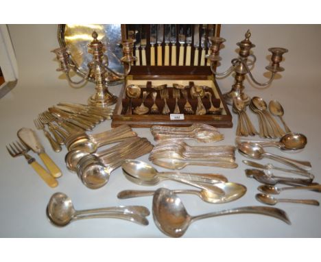 Pair of plate on copper three light candelabra, an oak cased plated canteen of cutlery, plated salver and miscellaneous plate