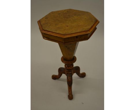 Victorian figured walnut octagonal trumpet form work table on tripod support 