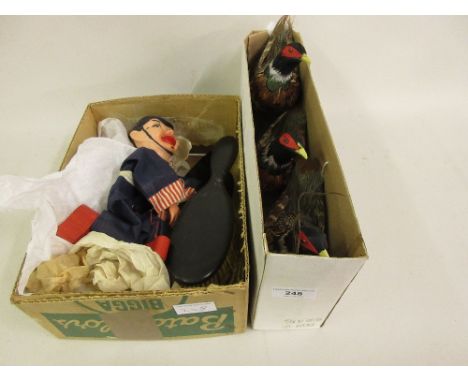 Three small pheasant figures, a puppet in the form of a Policeman and an ebony dressing table set 