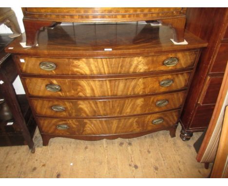 Good quality reproduction mahogany bow front chest, the figured crossbanded top above four graduated drawers with oval brass 