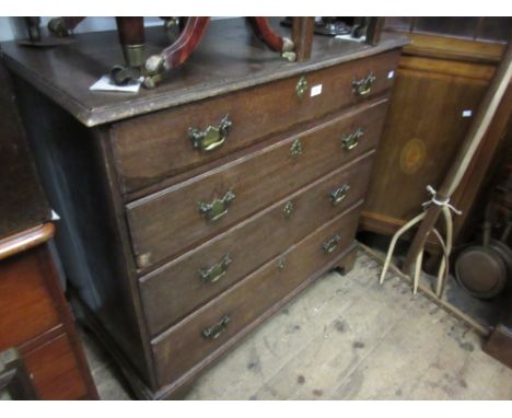 Mid 18th Century oak chest, the moulded top above four graduated drawers with brass swan neck handles and escutcheons on brac