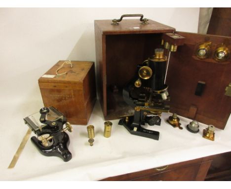 R. and J. Beck, London, gilt brass and black japanned monocular microscope with various lenses in mahogany fitted case, toget