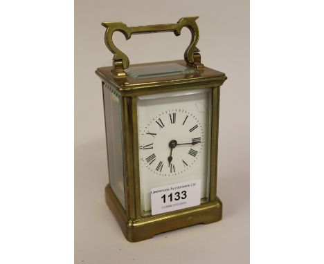 Gilt brass carriage clock, the enamel dial with Roman numerals (dial at fault) 