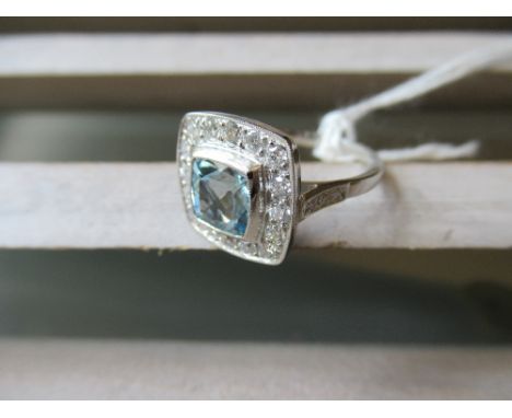 Platinum square aquamarine and diamond cluster ring 