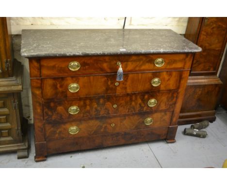 19th Century French mahogany commode with a grey flecked marble top above four graduated drawers, the oval brass handles embo