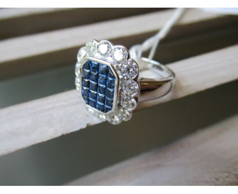 18ct White gold ring set multiple sapphires surrounded by brilliant cut diamonds 