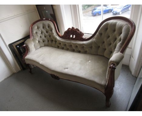 Victorian carved mahogany and button upholstered double chair back sofa on cabriole supports 