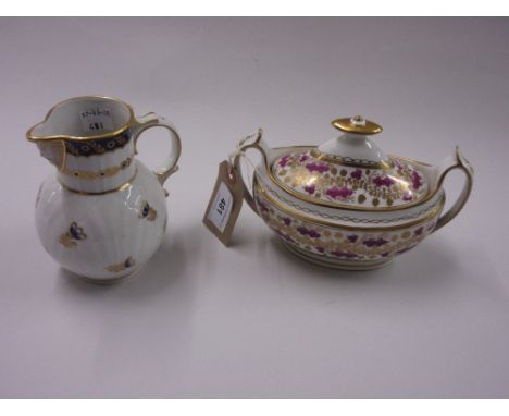 Early 19th Century Spode sucrier decorated with a floral design in puce and gilt, together with a Worcester type mask head ju