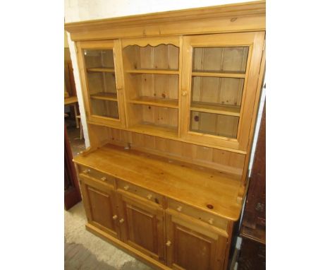 Reproduction pine dresser with a shelf and cupboard back above three drawers and three panelled doorsMEASURES 20IN DEEP X 60I