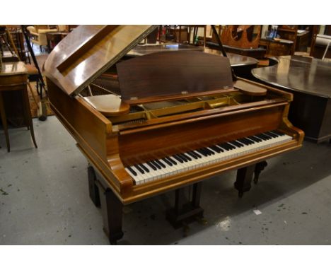 Steinway and Sons rosewood cased boudoir grand piano raised on later mahogany square tapering supports with brass casters, va