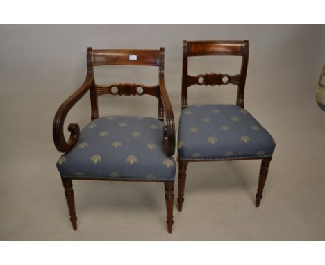 Set of six (four plus two) Regency mahogany dining chairs, the reeded black line inlaid and pierced rail backs above overstuf