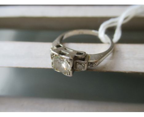 Art Deco platinum set diamond ring, the principal stone of approximately 1ct, flanked by stepped shoulders with further small