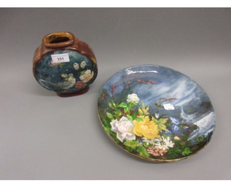 West Country pottery baluster form vase with painted floral decoration, similar moon flask and a similar plateVase is drilled