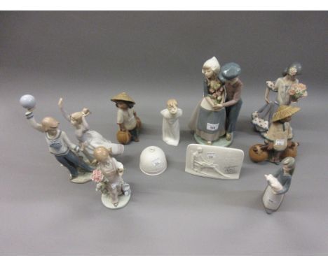 Group of eight various Lladro figures and groups of children together with a Lladro 1991 bell and Collectors Society plaqueBo