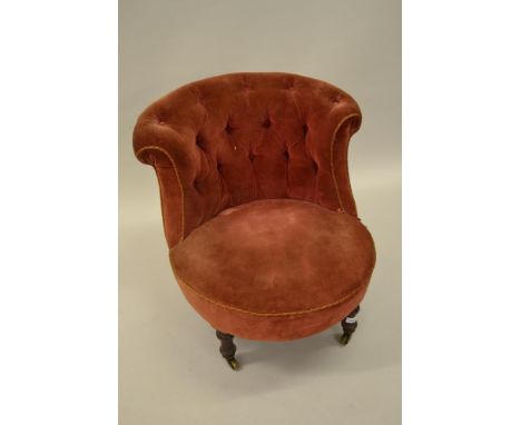 Victorian pink button upholstered low seat nursing chair on turned supports, together with a mahogany hanging corner cabinet 