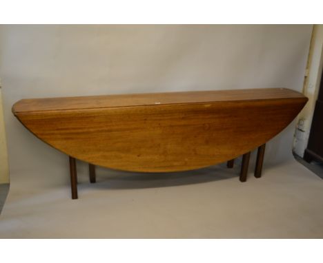 Large reproduction mahogany oval drop-leaf dining / wake table, the figured top above square cut moulded supports, 8ft x 4ft 