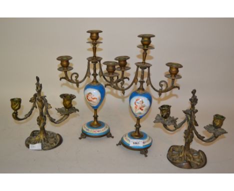 Pair of 19th Century French gilt brass and porcelain mounted three light candelabra, together with a pair of gilt metal rococ