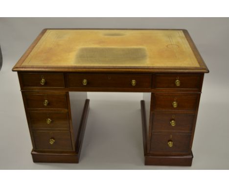 William Tillman, small good quality reproduction mahogany twin pedestal desk with a leather inset top above nine drawers with