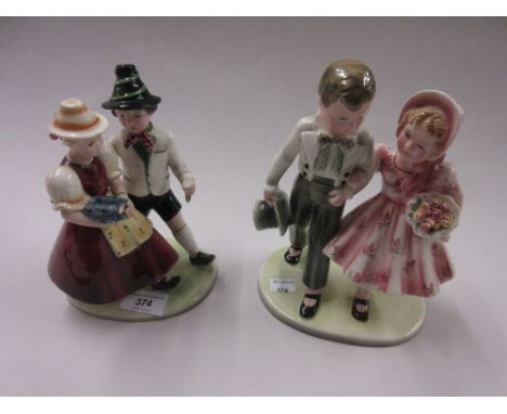 Goldscheider pottery group of children, together with another similar 