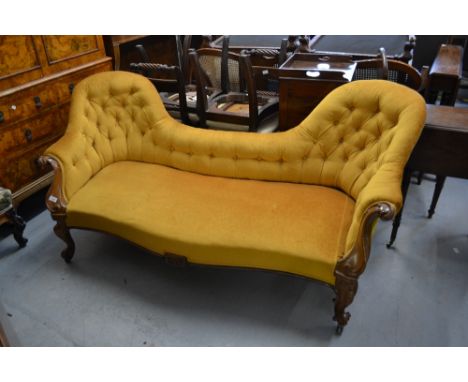 Victorian walnut and button upholstered double chair back sofa on scroll carved and cabriole front supports 