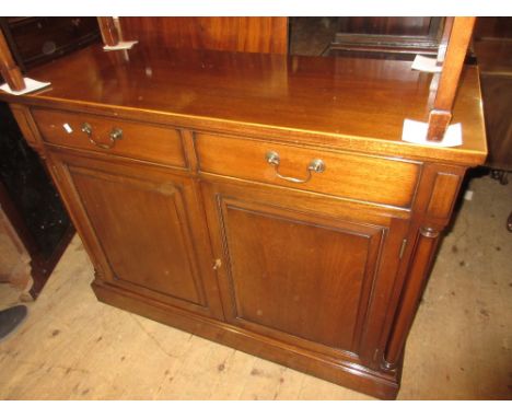 Good quality reproduction mahogany side cabinet with a boxwood line inlaid top above two drawers and two fielded panelled doo