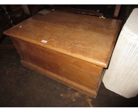 Small 19th Century pine trunk with hinged cover and iron end handles 