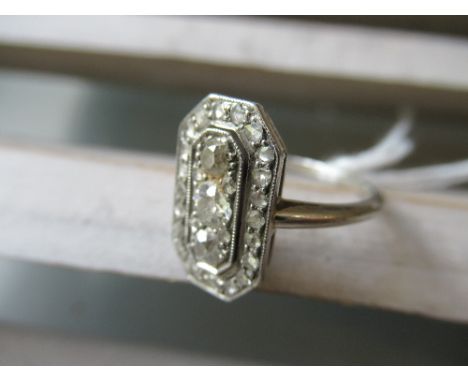 Art Deco octagonal dress ring set three old brilliant cut diamonds surrounded by diamond chipsLength and width of ring head 1