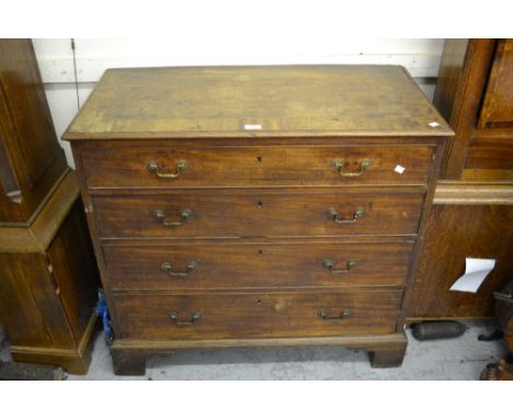 George III mahogany straight front chest, the crossbanded and line inlaid top above four graduated drawers with brass swan ne