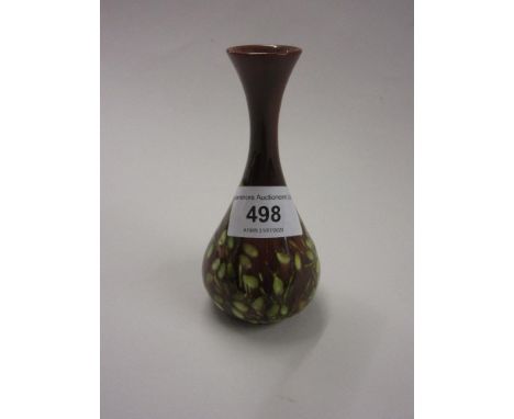 Christopher Dresser for Linthorpe pottery, a small narrow necked vase with honesty decoration on a brown ground, 4.5ins highV