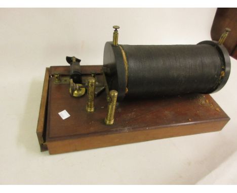 Large late 19th / 20th Century induction coil on a rectangular mahogany plinth base (at fault) 