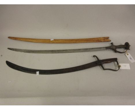 Indian Tulwah with a wooden scabbard, together with an antique cavalry sabreBlade 29ins x 1.25insNo makers marks 