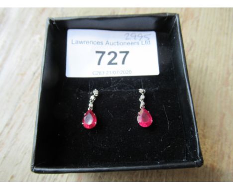 Pair of platinum ruby and diamond set drop-earrings 