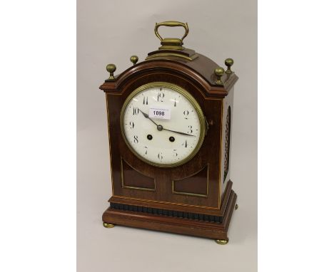 Edwardian mahogany brass mounted and line inlaid bracket clock, the broken arch case with a brass carrying handle, the circul