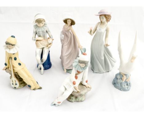 A Lladro dancer, No 5663 and five Nao figures and another similar (7) (af)