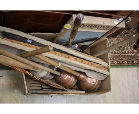 A carpet beater, a wooden dolly, two baguette baskets, washboard, chestnut roaster and cast iron pan (1 box)