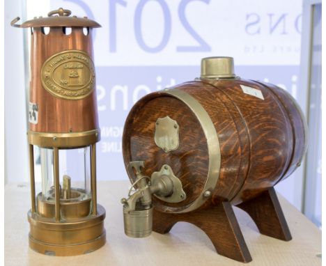 A E Thomas and Williams copper/brass mining lamp and a coppered barrel on legs 