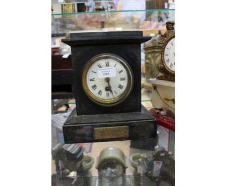 An early 20th Century black slate mantle clock, Circa 1914 with pendulum and associated key 