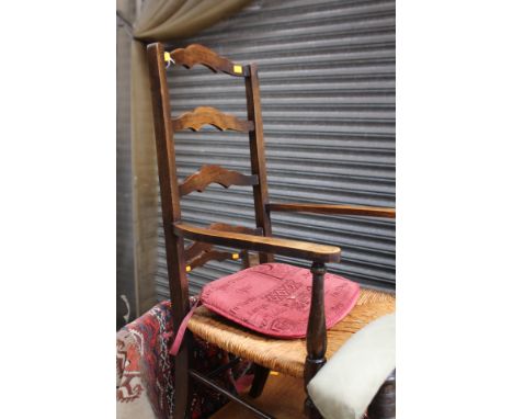 A set of five oak and beech rush seated ladder back chairs